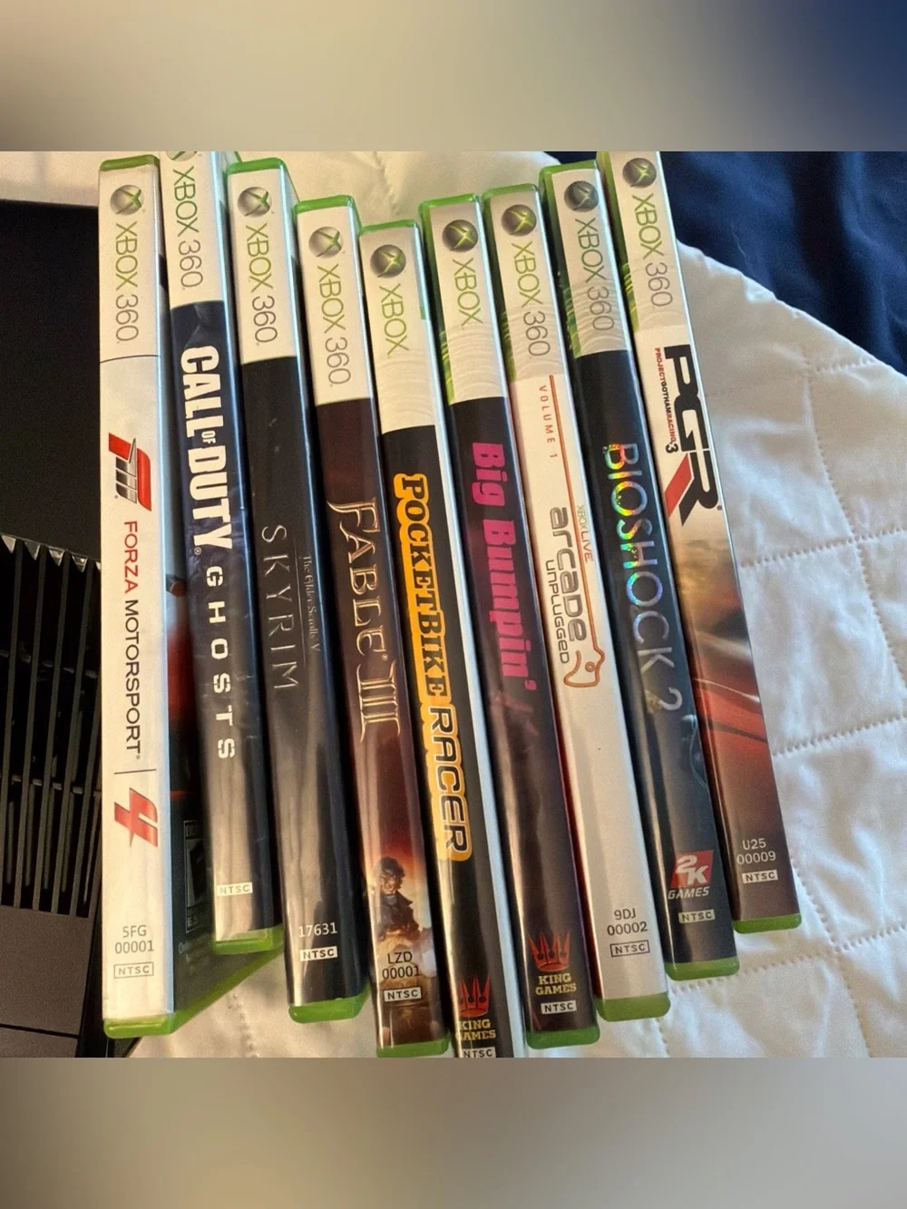 Microsoft Xbox 360 Slim Bundle - Console, 3 Controllers, Battery Pack & 9 Games